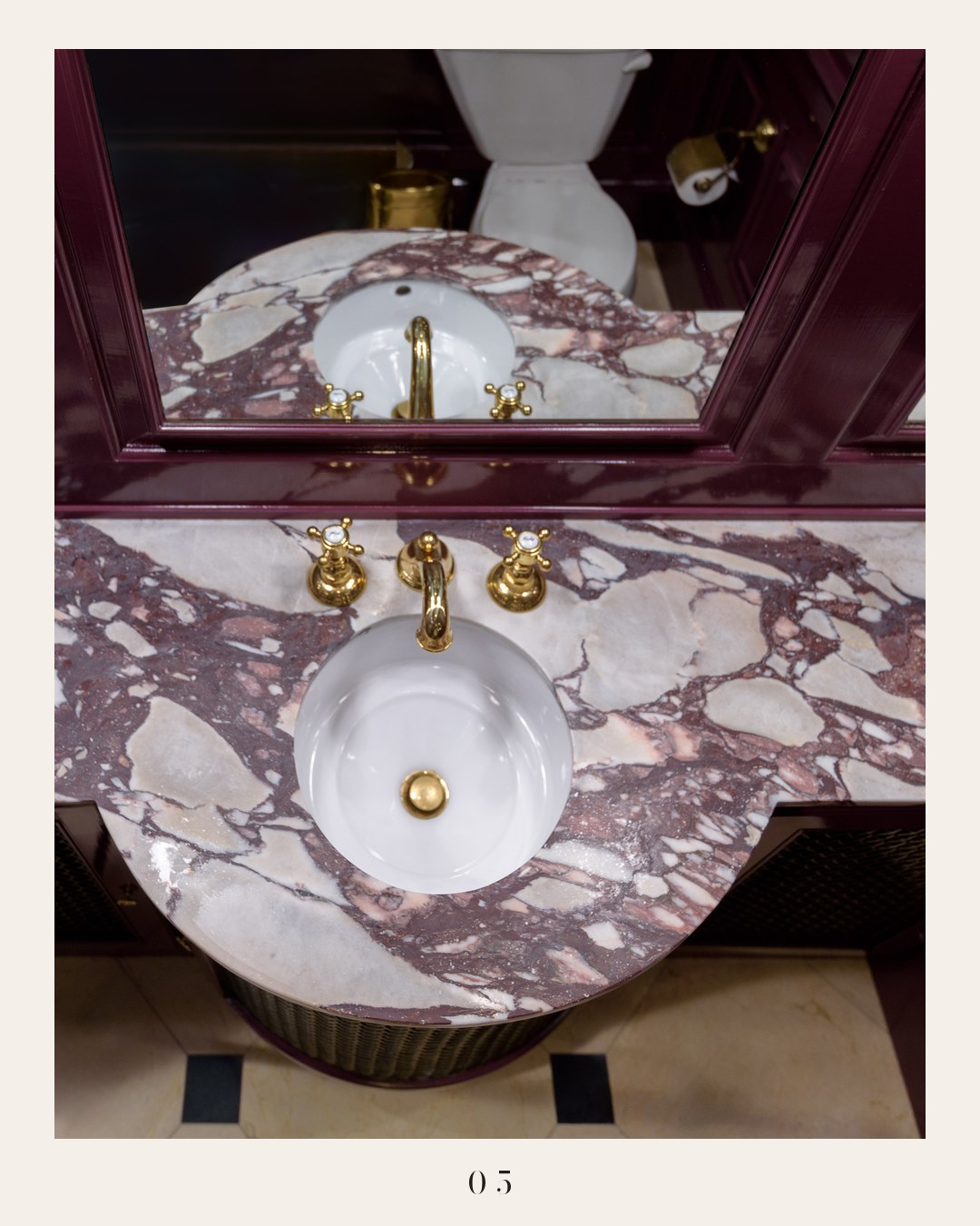 A Touch of Stone carousel slide: violet-veined marble vanity with brass fixtures